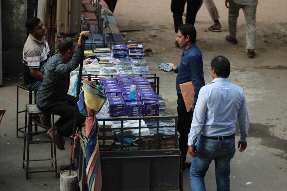 Ivorian shop owner using a free POS app with mobile money