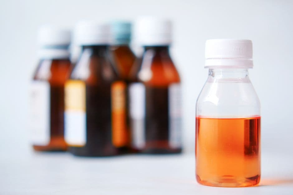 Medicine bottles ready to be dispensed at a pharmacy