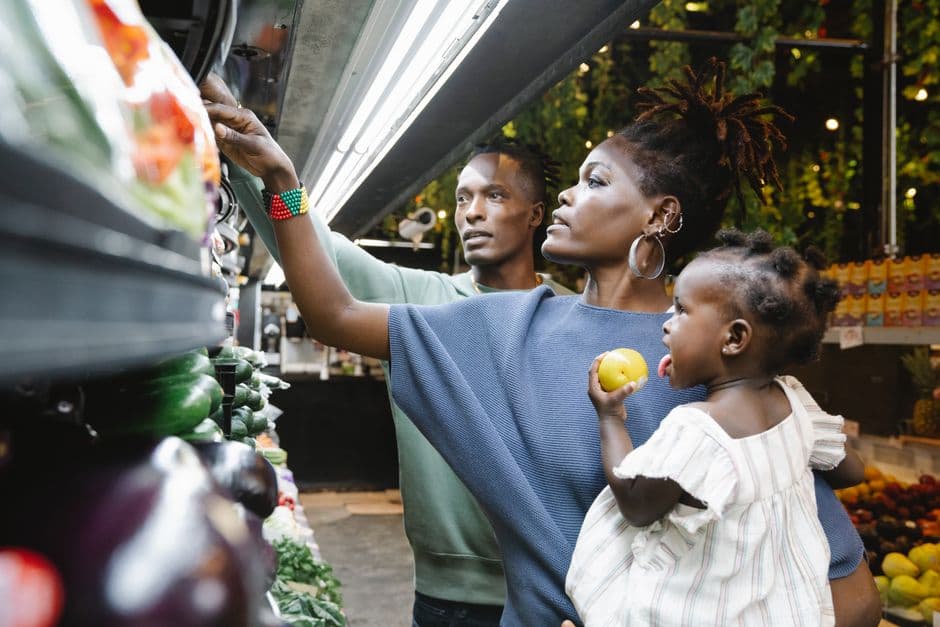 Shopper in the aisle of an African supermarket